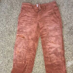 stressed burnt orange corduroys